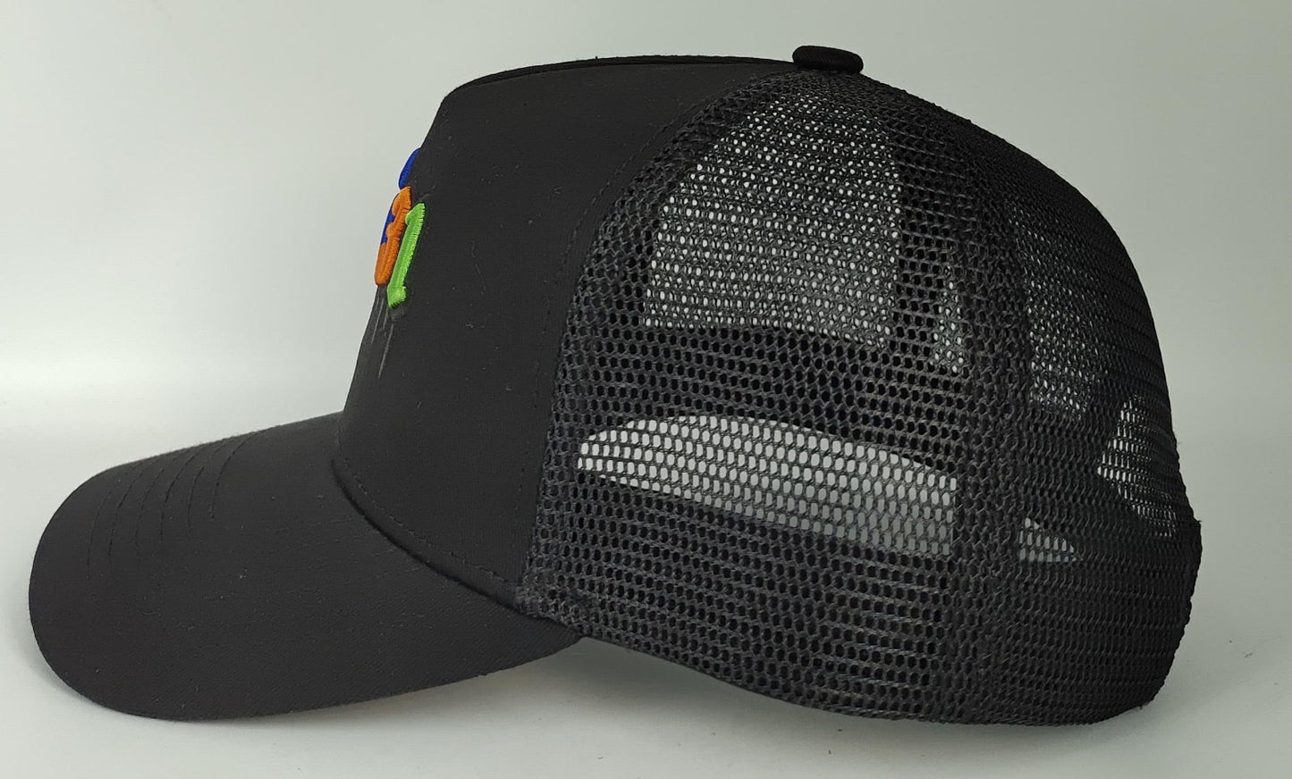 51631 Black Drip Logo Trucker Hat